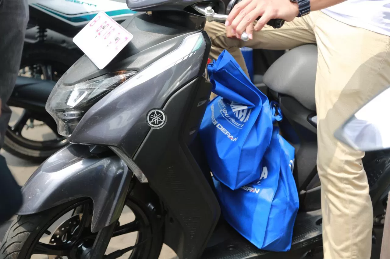 Tips Berkendara Membawa Barang di Sepeda Motor