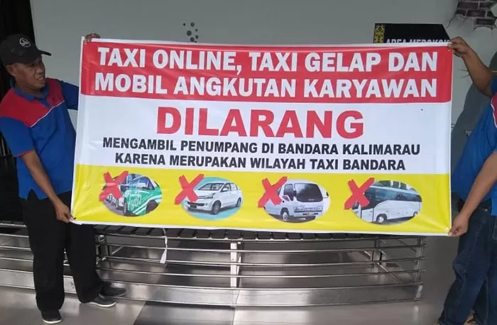 TIDAK BOLEH: Berdasarkan Permenhub Nomor 117/2019, taksi online, taksi gelap dan mobil angkutan karyawan diminta tidak mengangkut penumpang di Bandara Kalimarau.