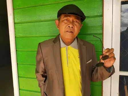 KECEWA: Ketua RT 4 Gunung Tabur, Endin Supandi mengaku kecewa dengan penilaian lomba kebersihan antarRT tahun ini.