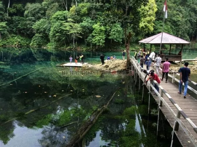 MULAI RAMAI: Objek wisata Telaga Biru di Kampung Tembudan mulai ramai dikunjungi wisatawan.