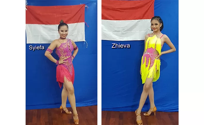 MEMBANGGAKAN: Syifa (Ungu) dan Zhieva (Kuning) raih 7 medali di ajang Cordillera Festival Dance Championship, beberapa waktu lalu.