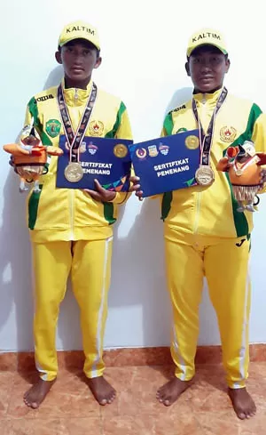 PASANGAN JUARA: Aidil dan Abdul turut menyumbangkan medali emas untuk kontingen Kaltim di PON XX Papua.