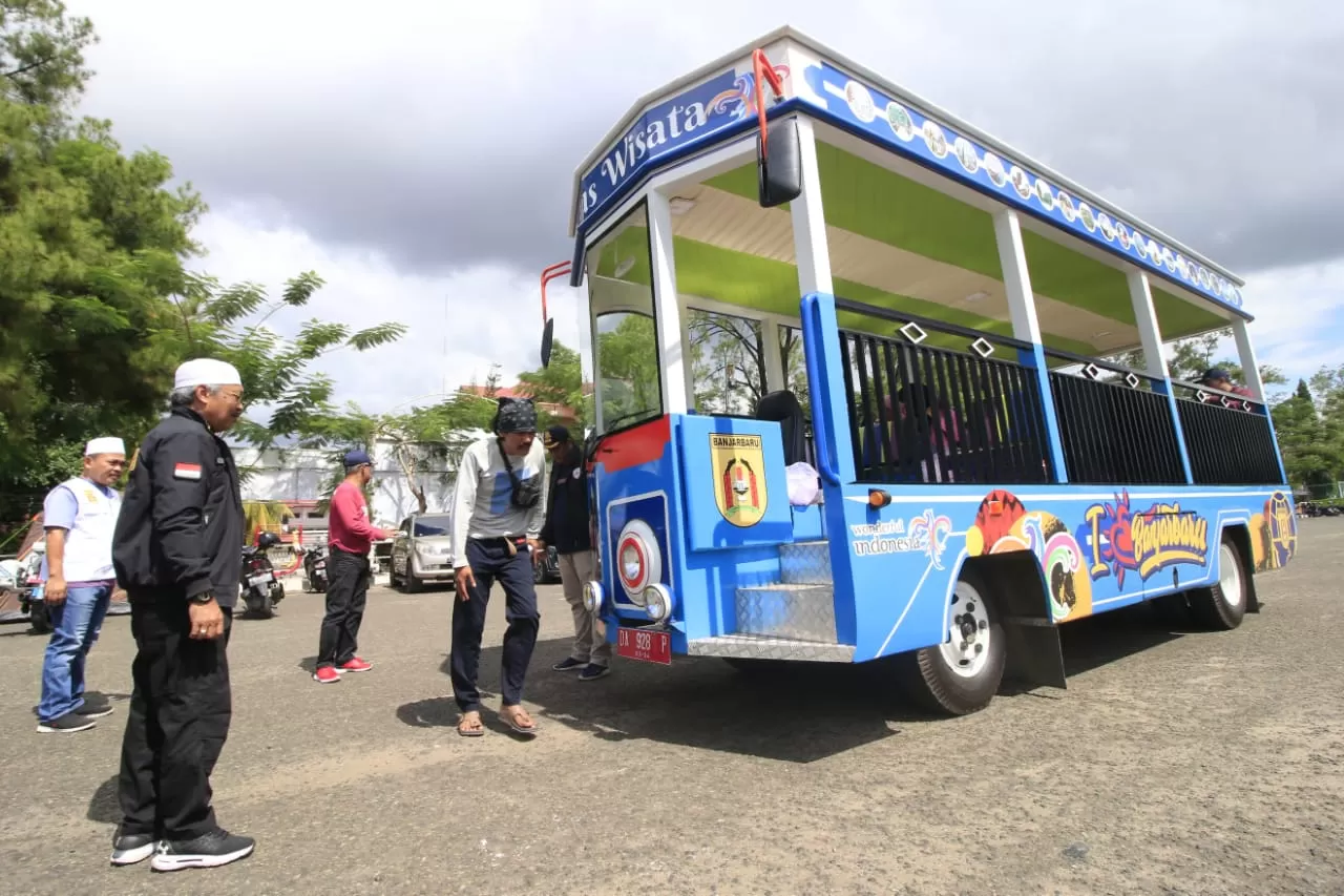 SIAP MENGANTAR: Layanan bus gratis untuk mengangkut jemaah Haul Abah Guru Sekumpul ke-15 sudah beroperasi.