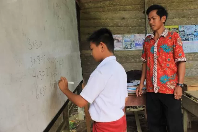 KEBIJAKAN: Proses belajar mengajar di salah satu sekolah di Kabupaten Tapin sebelum diterpa pandemi Covid-19.