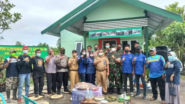 SINERGI BERSAMA: Kecamatan Liang Anggang Banjarbaru bersama Kodim 1006/MTP, meresmikan hasil aksi bedah rumah salah satu warga Landasan Ulin Utara Kecamatan Liang Anggang Banjarbaru.