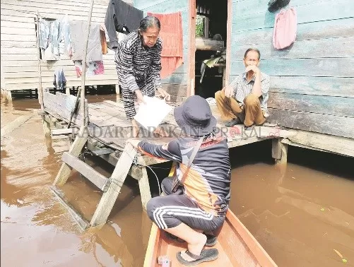 MASIH BANJIR: Sejumlah desa di Sembakung mengalami banjir sejak akhir Mei lalu. FOTO: DOKUMENTASI BPBD NUNUKAN