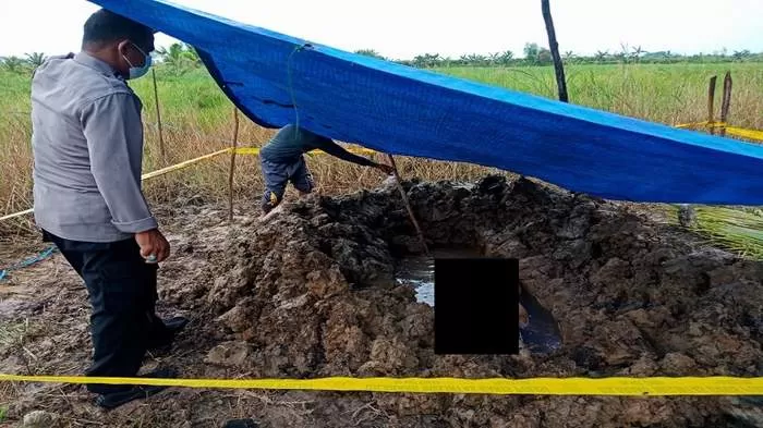 Lokasi makam di Desa Sei Teras Kecamatan Kapuas Kuala Kabupaten Kapuas yang dibongkar orang tidak dikenal, Sabtu (14/5/2022).(HUMAS POLRES KAPUAS)