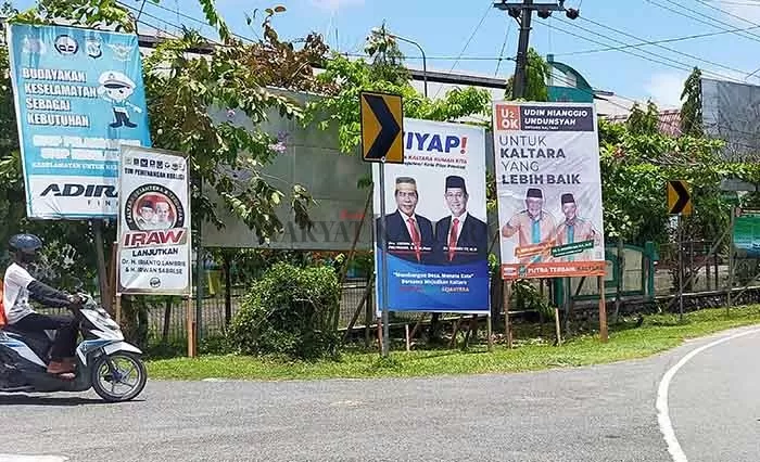 MULAI SOSIALISASI: Baliho calon Gubernur dan Wakil Gubernur Kaltara dipasang di Jalan Sei Sesayap tepatnya di depan gedung tenis indoor Telaga Keramat.