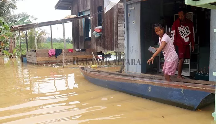 LANGGANAN BANJIR: Desa Bulu Perindu Kecamatan Tanjung Selor sering menjadi langganan banjir jika air Sungai Kayan meluap.