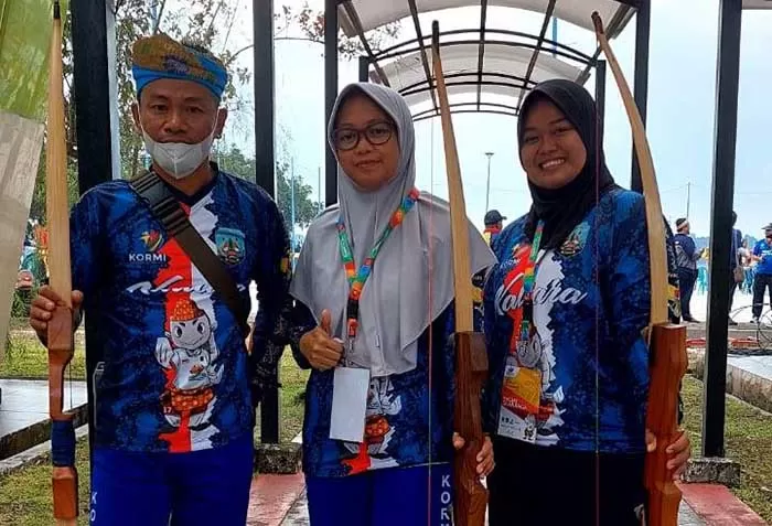 REBUT EMAS: Pada FORNAS VI di Palembang, tim panahan tradisional Kaltara berhasil menyabet medali emas.
