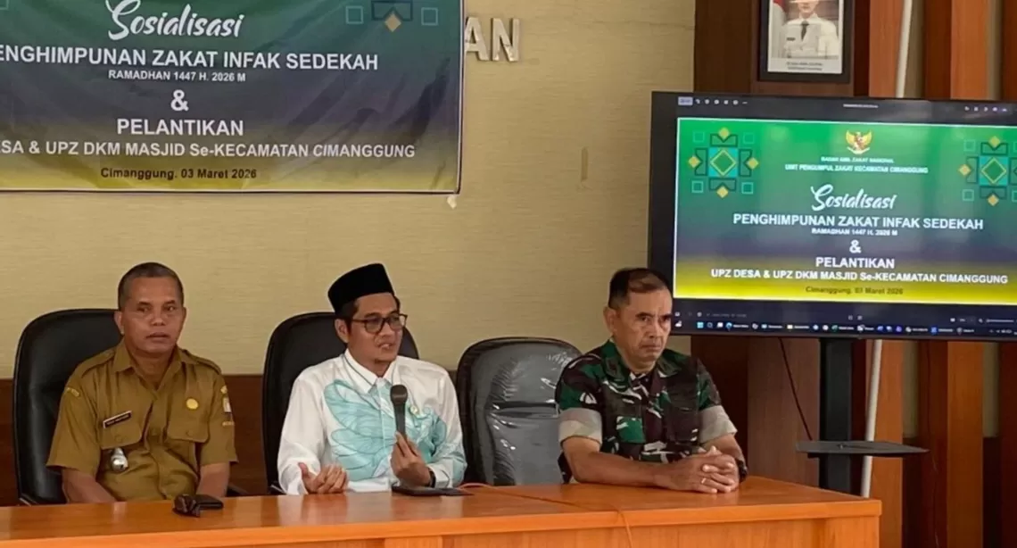Wakil Ketua IV Baznas Kabupaten Sumedang, Dr. Budi Solihin, M.A., saat memberikan materi pada sosialisasi ZIS dan pelantikan UPZ se-Kecamatan Cimanggung, Selasa (3/3/2026).