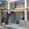 Pererat Kebersamaan, Babinsa Koramil Sanankulon Laksanakan Pengecatan Masjid Nurul Huda Blitar