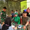 Semarak HUT Ke-81 TNI, Satgas Yonarmed 13/Nanggala Gelar Bakti Sosial hingga Khitanan Gratis di Perbatasan RI–Malaysia