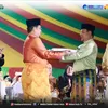 Wabup Syafruddin Poti Tegaskan Rokan Hulu Siap Jadi Tuan Rumah MTQ Riau Tahun 2027, di Kuansing Juara 1  Pawai Ta'aruf dan Stand Bazar