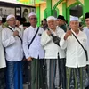 Muktamar NU ke-35 di Jombang Dibanjiri Jamaah, Rombongan Yalal Wathon Sidoarjo: Ngalap Berkah Poro Yai