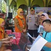 Polsek Gedangan Bersama Tim Kesehatan Polresta Sidoarjo Hadirkan Pelayanan Publik Lewat Pos Kamling Goes to RT