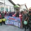 Prajuti Yonif TP 449/SH Larut Dalam Kecerian Lomba 17-an Bersama Warga