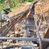 Babinsa Karanggede Turun Langsung, Dukung Percepatan Pembangunan Jembatan Perintis Garuda