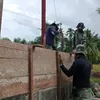 Babinsa Kodim 0108 Gotong Royong Bangun Jembatan di Agara