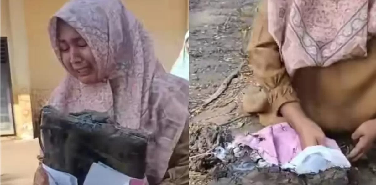 Guru di Pidie Jaya menangis saat laptop berisi data penting terendam lumpur. (TikTok/mra_210624)