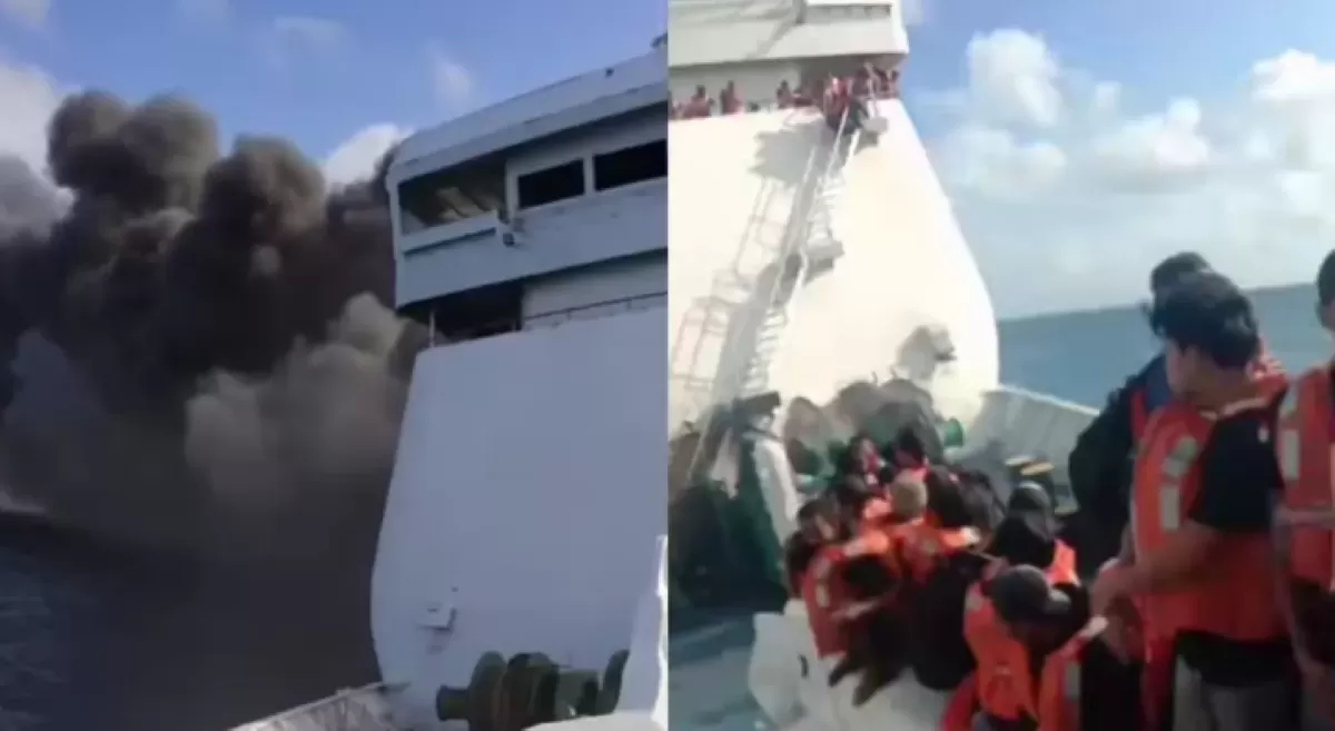 KMP Mutiara Sentosa 2 rute Surabaya-Makassar terbakar di Perairan Sumenep, Jawa Timur, Minggu (2/8/2026). Penumpang mengenakan pelampung sambil menunggu proses evakuasi. (Threads/@acholatif)