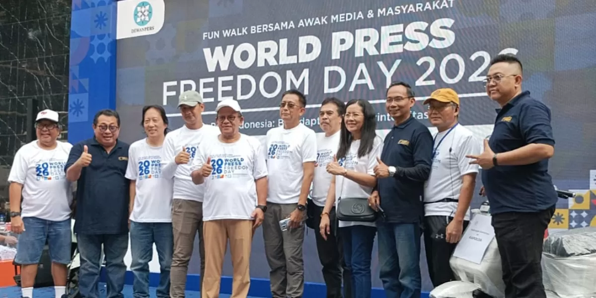 Ketua Umum SMSI Firdaus bersama Sekjen Makali Kumar menghadiri kegiatan Fun Walk Dewan Pers dalam rangka World Press Freedom Day 2026 di Jakarta, Minggu (10/5/2026). (Dok. Pontianak Globe)