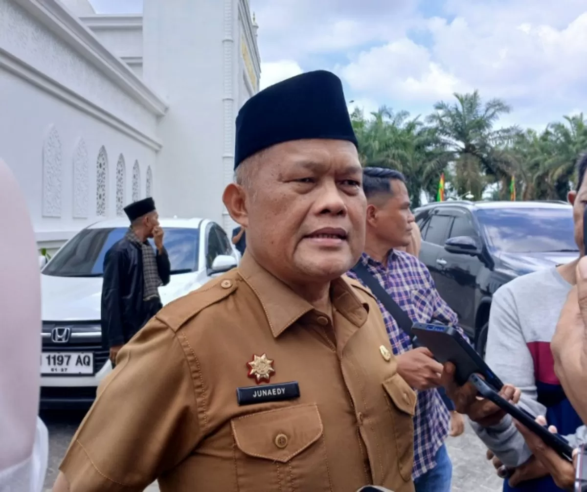 Plt Kepala Dinsos Kota Pekanbaru, Junaedy. (f: Ist)