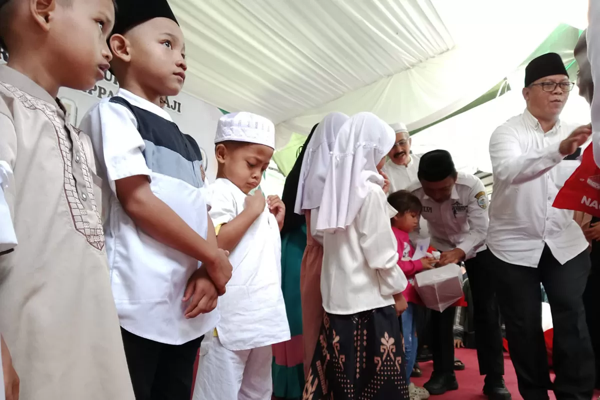 HIPATAS Pasar Cikurubuk mengisi peringatan Isro Miraj 1447 H dengan Tabligh Akbar dan santunan anak yatim di Pasar Cikurubuk, Kota Tasikmalaya. (Dok. Asep M.S)