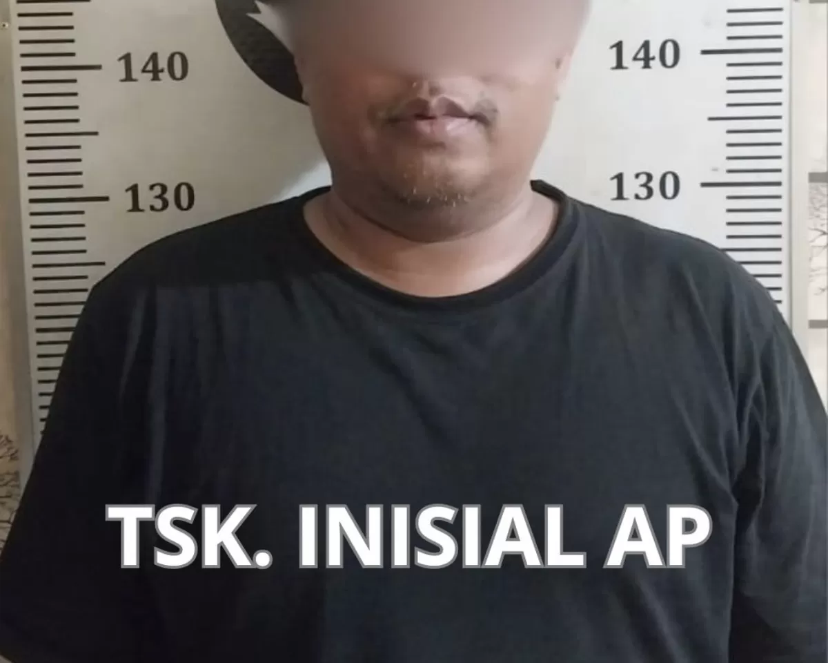 Mantan Kepala Sekolah SMA Taruna Kepulauan Riau, berinisial AP (41) sebagai tersangka. (Humas Polresta Barelang.)