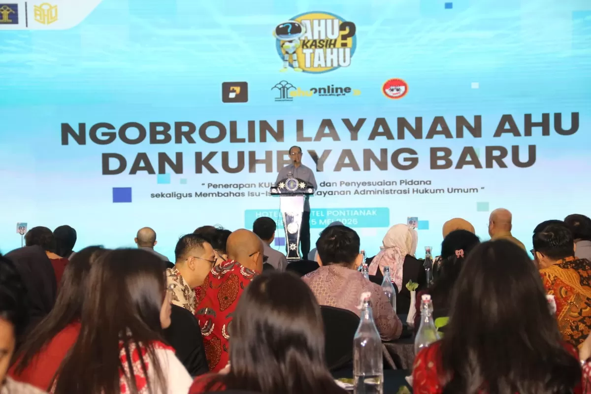 Direktur Jenderal Administrasi Hukum Umum (AHU), Dr. Widodo, S.H., M.H. Saat menyampaikan sambutannya dalam kegiatan bertajuk "Ngobrolin Layanan AHU dan KUHP yang baru", di Novotel, Selasa (5/5/2026).  (Wilhelmus Triputra)