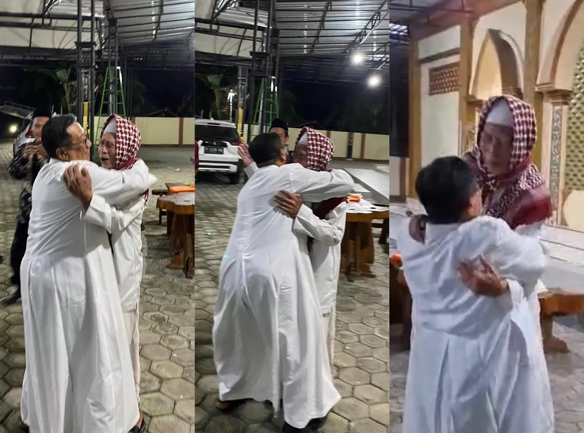Romo Damianus Fadjar Tedjo Soekarno berangkulan dan kemudian menggendong Ulama Kharismatik KH Fathulloh Suyuti Toha di Pondok Pesantren Mansyaul Huda, Banyuwangi, Minggu malam (14/6/2026). (Dok. Pontianak Globe)