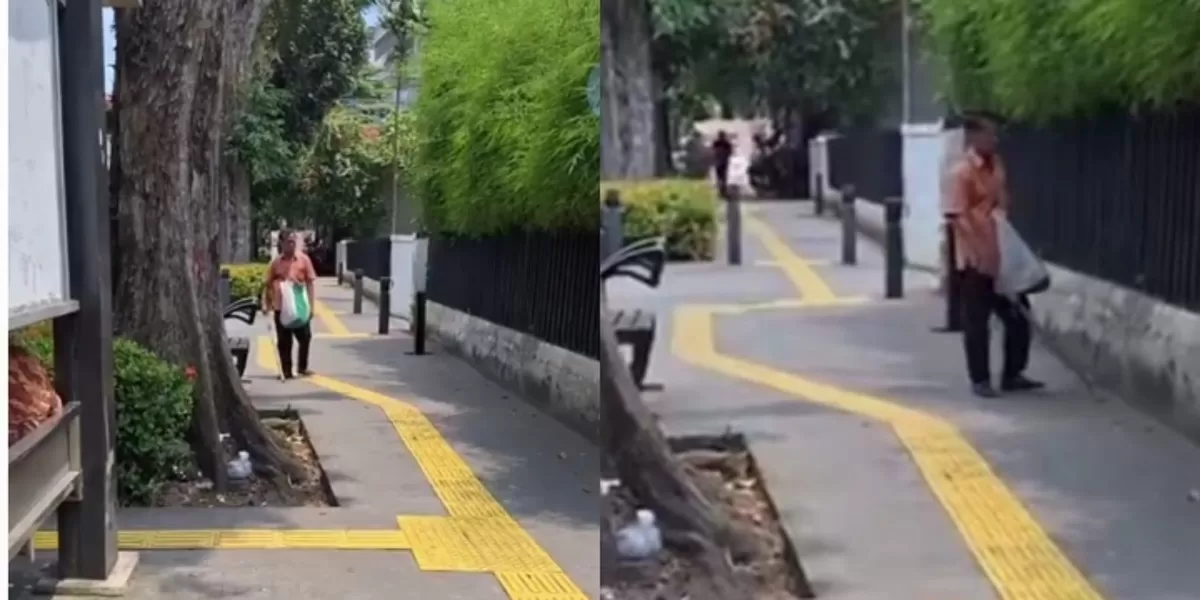 Seorang penyandang tunanetra kesulitan mengikuti guiding block berkelok di trotoar kawasan Cikini, Jakarta Pusat. (Instagram/elisahur103)