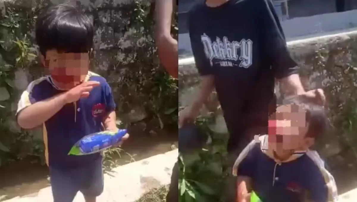 Pria Terekam Tampar dan Jambak Bocah Saat Sedang Makan Jajanan. (Facebook: Nandang Kusmana)