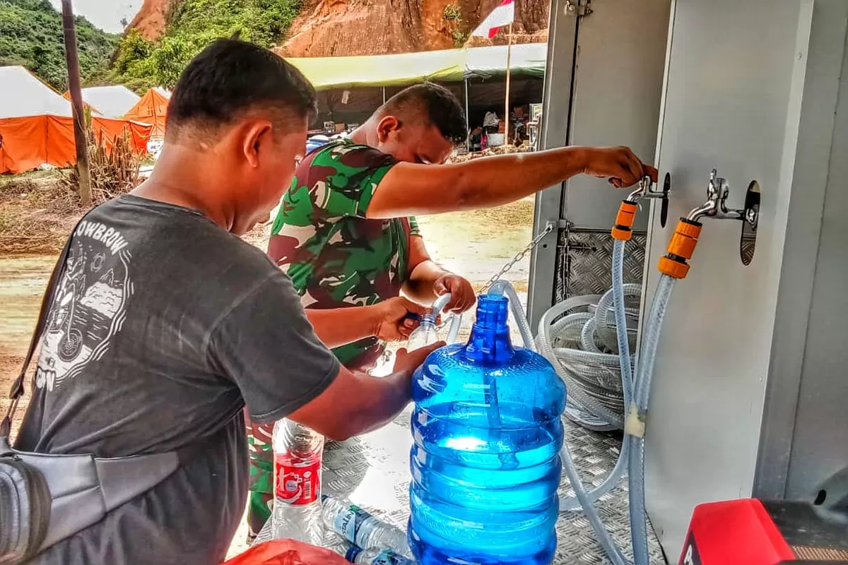 Korban Banjir Sumatera dan Aceh Terbantu Bantuan Water Treatment Kemenko Polkam