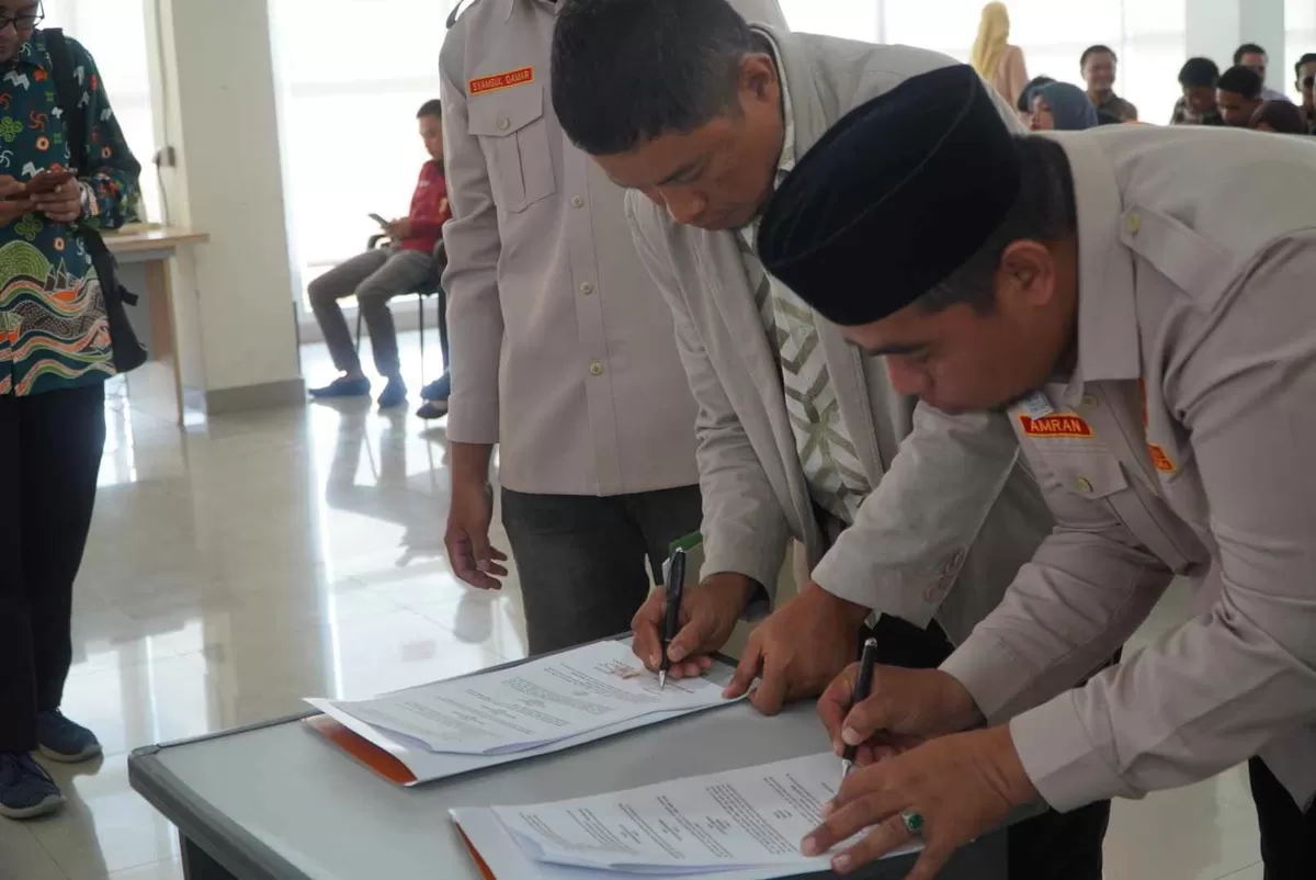 Penandatanganan MoU Bawaslu Bulukumba dan Pemuda Muhammadiyah berlangsung di Ruang Kahayya, Gedung Pinisi Bulukumba, Sabtu (25/7/2026).