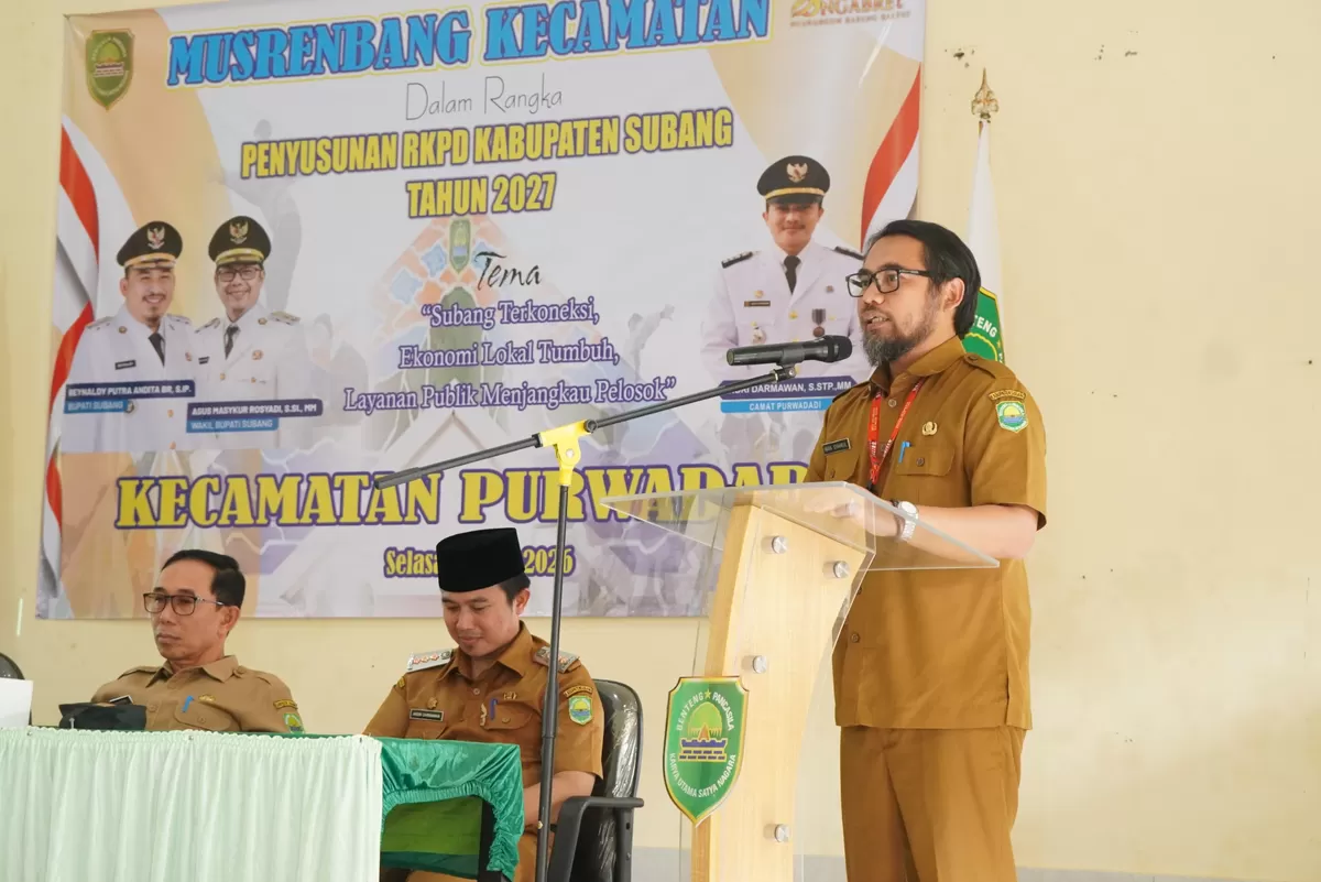 Kepala BP4D Subang, Iwan Syahrul Anwar, menyampaikan arah kebijakan Musrenbang RKPD 2027 saat pembukaan di Aula Kecamatan Purwadadi, Selasa 24 Februari 2026 (Dok. Istimewa)