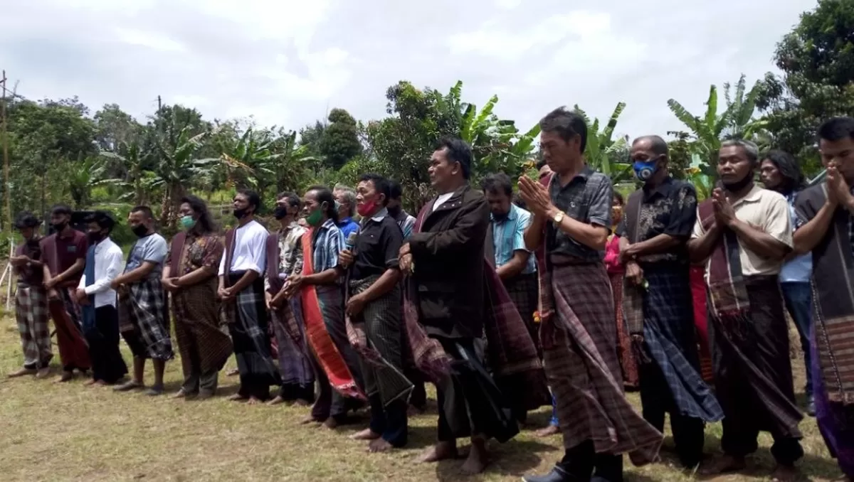 ilustrasi masyarakat Batak sedang lakukan upacara adat (tobaria)