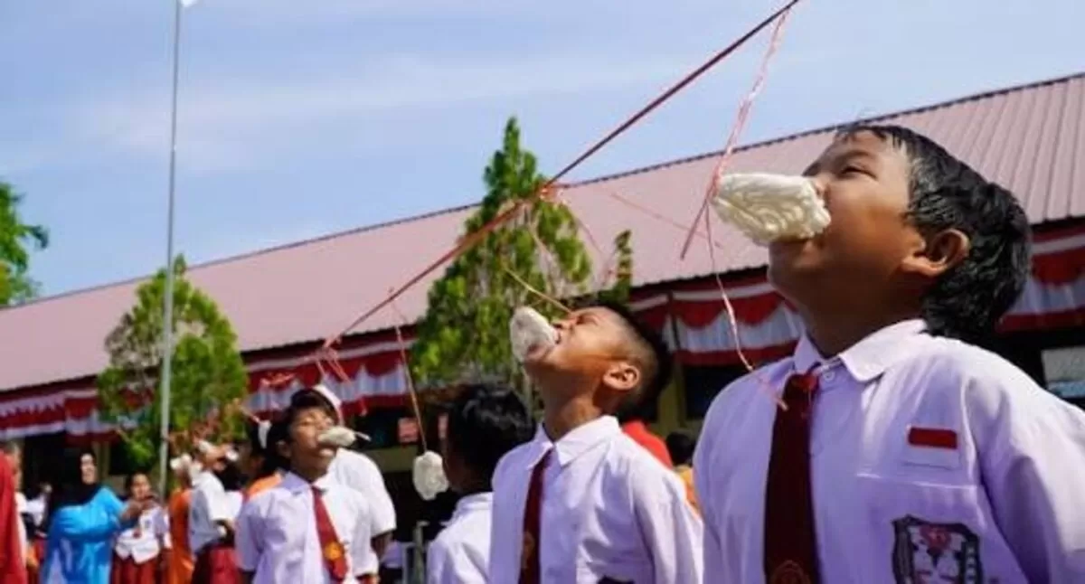 Ilustrasi Lomba Makan Kerupuk (info publik)