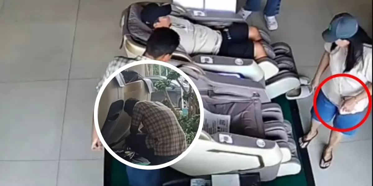 Seorang penjaga kursi pijat di Stasiun Surabaya Gubeng tampak menangis saat bertugas usai dituduh menghilangkan gelang pelanggan. (X.com/ bacotetangga)