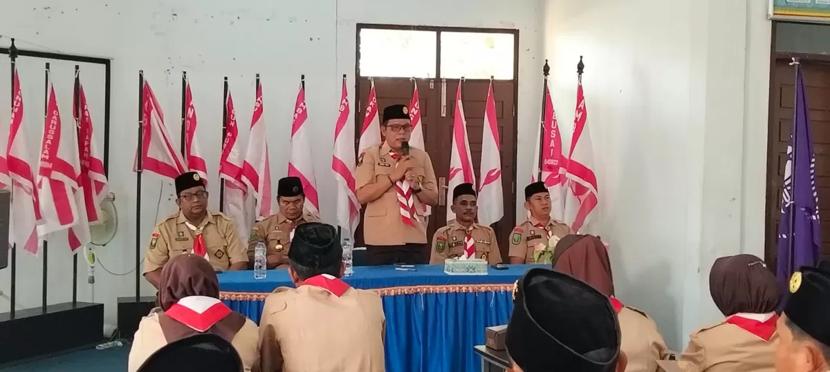 Foto Alreza Ahyu Terpilih Ketua Kwarcab Pramuka Kabupaten Rokan Hulu saat menyampaikan sambutannya  (NAWACITAPOST.COM)