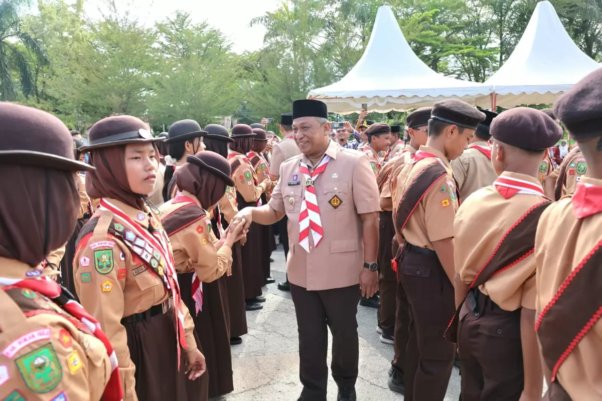 Foto Bupati Anton Buka Bulan Bakti Pramuka 2026, dan Lepas 48 Kontingen  Rokan Hulu  Pada Kegiatan Jambore Nasional ke Cibubur didampingi Ketua Kwarcab Pramuka Alreza Ahyu   (NAWACITAPOST.COM)