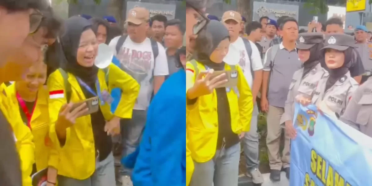 Polwan membentangkan spanduk &ldquo;kami siap melayani&rdquo; saat mengamankan aksi demonstrasi BEM UI di Bundaran HI Jakarta (Instagram/thejakartawave)