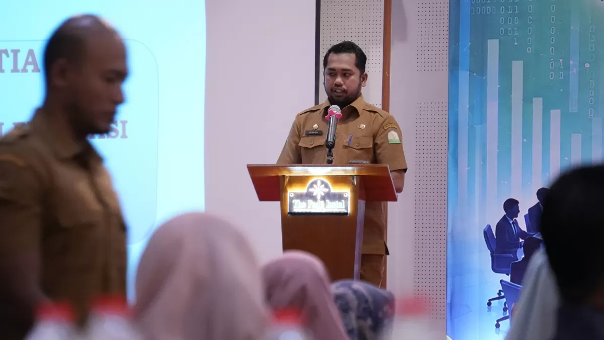 Kepala Bidang Pengendalian dan Evaluasi Pembangunan Daerah Bappeda Aceh, Mahdinarmansyah, selaku Ketua Panitia dalam kegiatan Forum Satu Data Aceh Tahun 2026 yang digelar di Ballroom The Pade Hotel