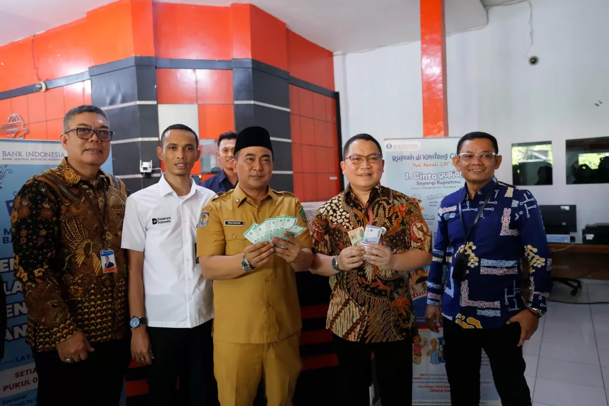 Bank Indonesia Perwakilan Provinsi Bengkulu bersama PT Pos Indobesia Lubcurkan program pembayarab oajak difital dan QRIS  sebagai pilot prohek di Kabuoateb  Rejang Lebong.(Foto/Ist(.