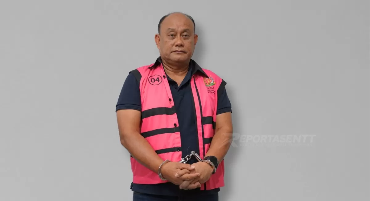 Tersangka Dadan mengenakan rompi tahanan usai ditangkap penyidik dan ditetapkan sebagai tersangka dalam kasus yang tengah diselidiki.