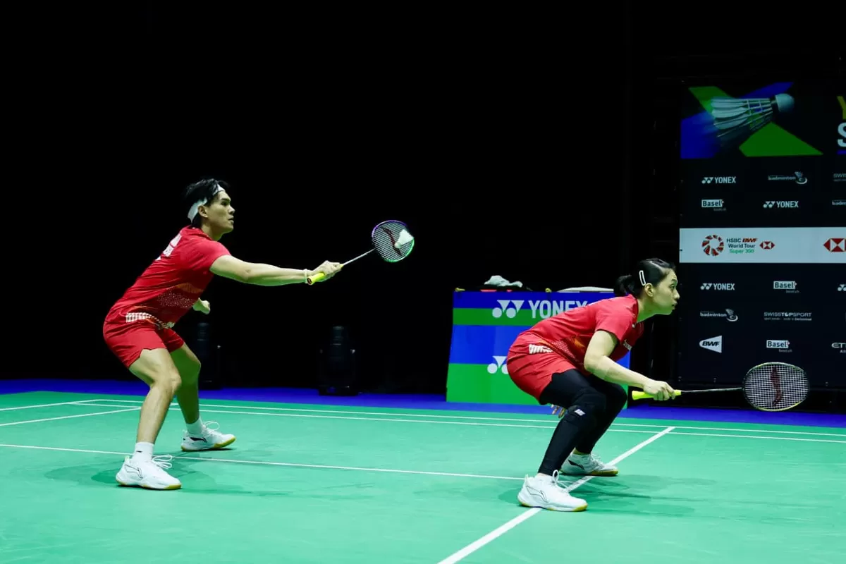  Pasangan Adnan Maulana/Indah Cahya Sari Jamil memenangkan "perang saudara" bersama wakil Merah Putih lainnya, Dejan Ferdinansyah/Bernadine Anindya Wardana di babak pertama ganda campuran Swiss Open   (PBSI)