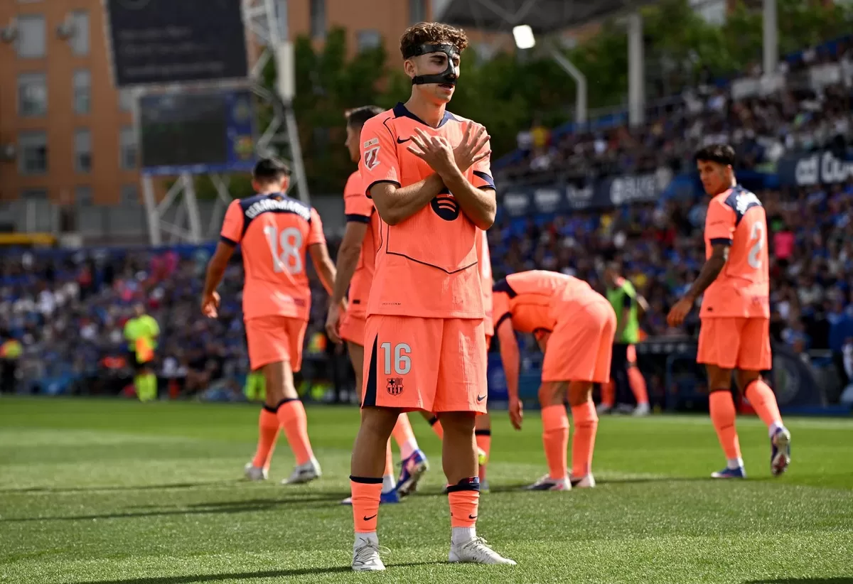Barcelona menaklukkan Getafe 2-0.
