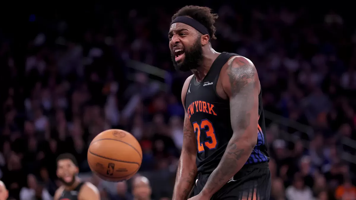 Center Knicks, Mitchell Robinson, kemungkinan besar akan absen di Final NBA setelah jari tangannya patah pekan ini.   (Imagn Images)