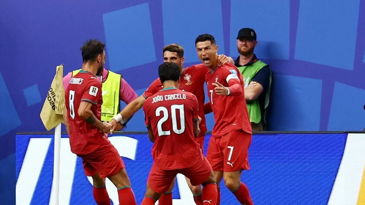 Penyerang Portugal Cristiano Ronaldo merayakan gol ke gawang Uzbekistan. (Getty Images)