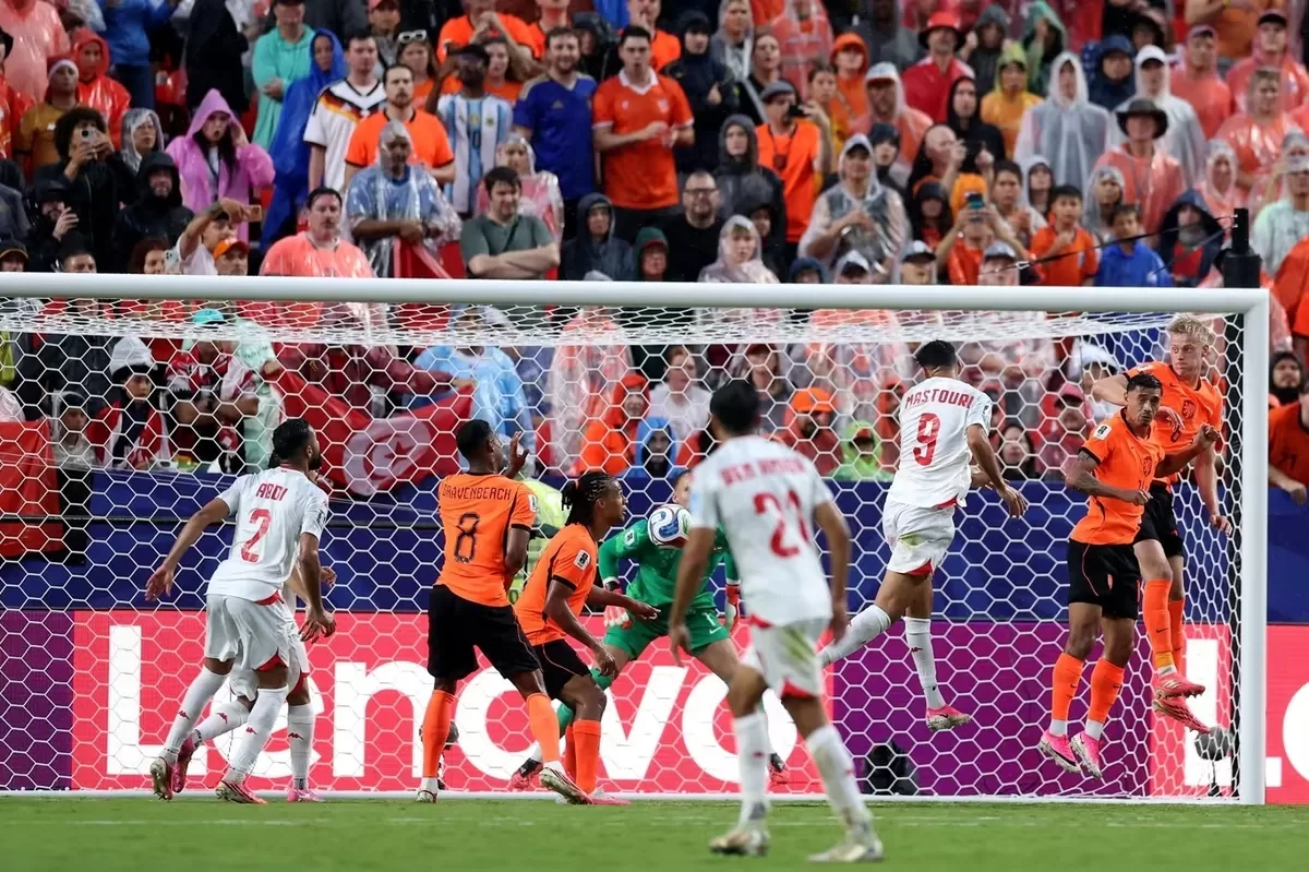 Belanda mengalahkan Tunisia untuk memastikan pertemuan dengan Maroko